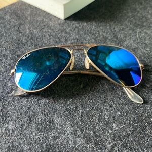 Ray-Ban gold aviator with blue lenses